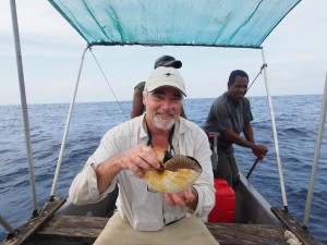 Peter Ward holding the rare Allonautilus scrobiculatus that he last saw 31 years ago. (Photo by Gregory Jeff Barord)